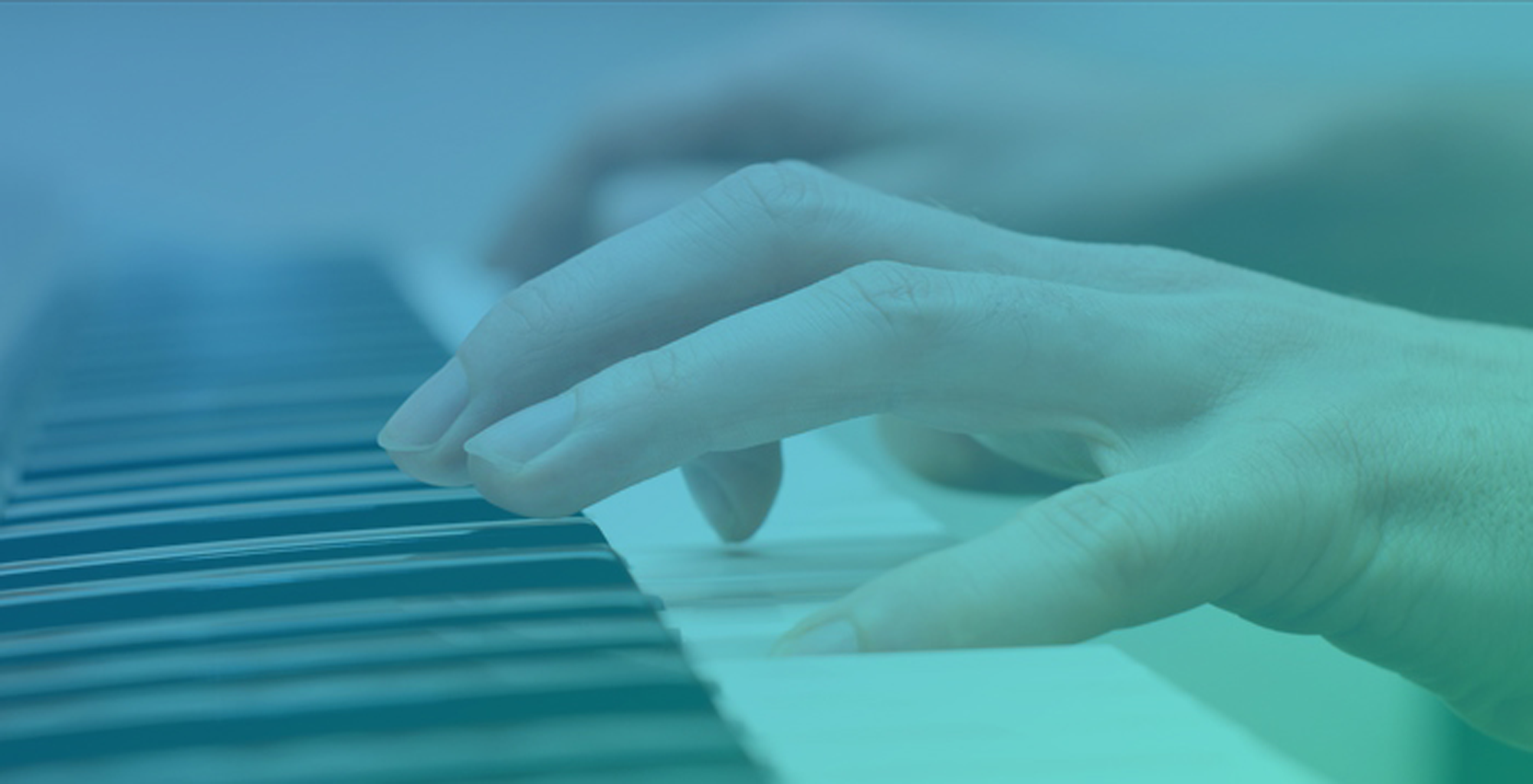 adult hands playing piano